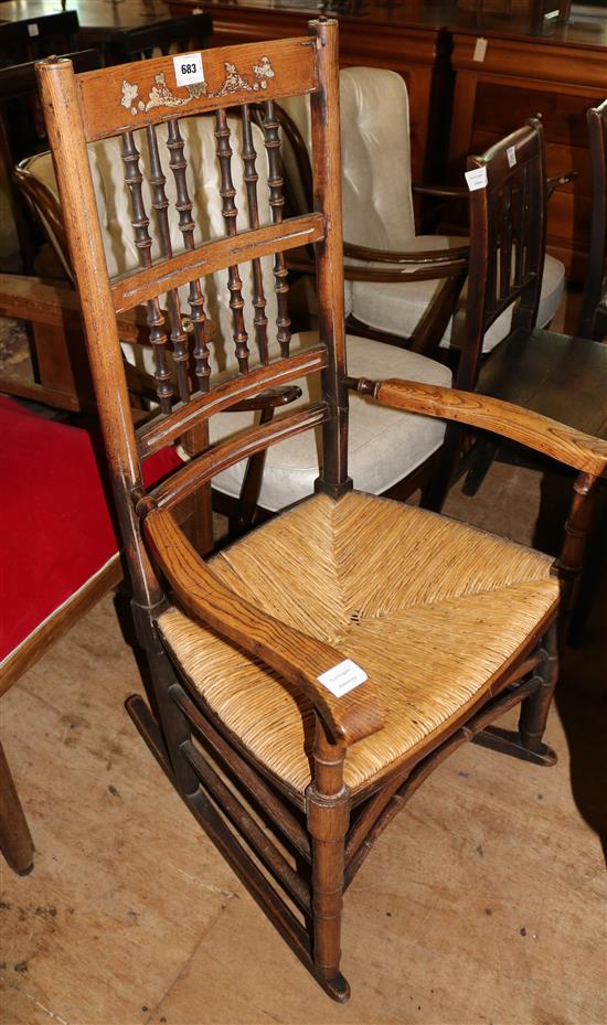 Ash rush seated rocking chair and a pair of Regency oak wood seat chairs (3)(-)